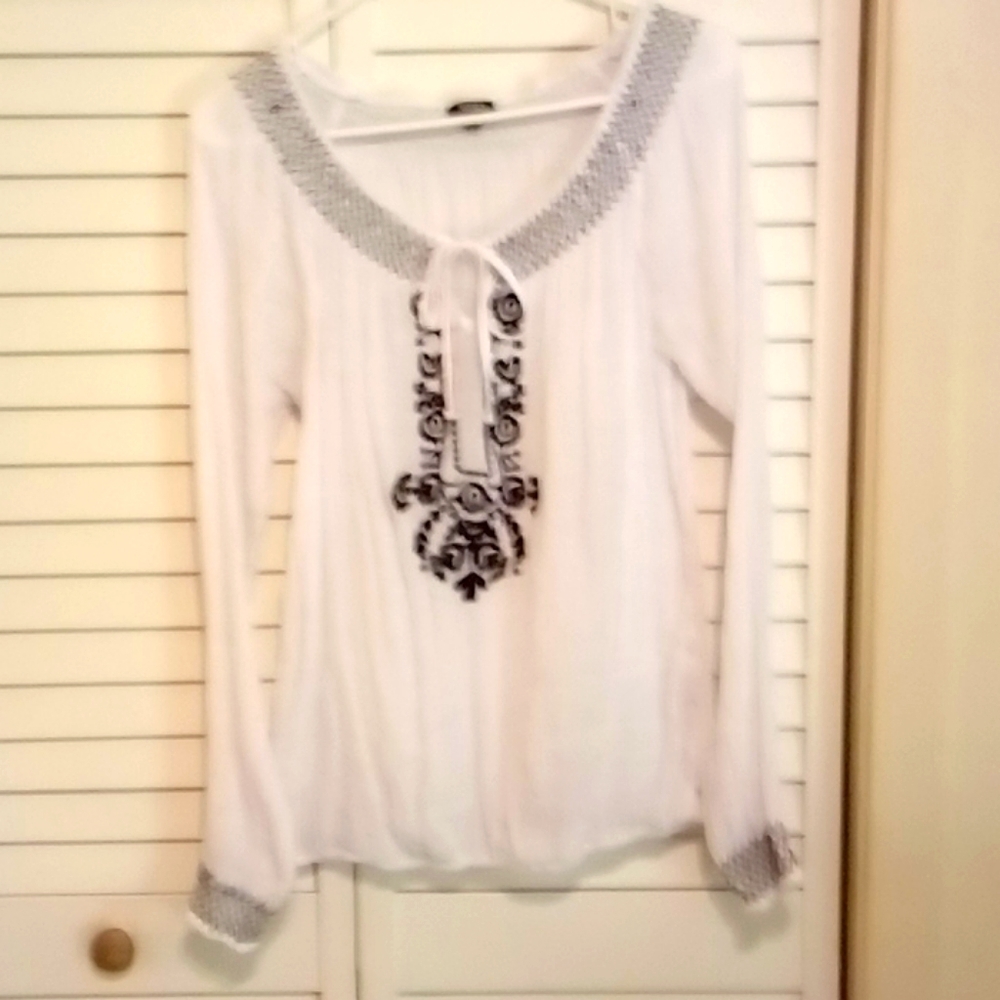 Woman's XOXO embroidered blouse.